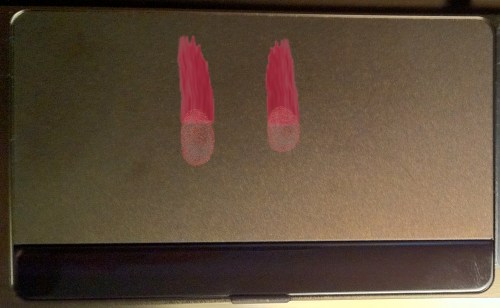 Moving two fingers up or down.